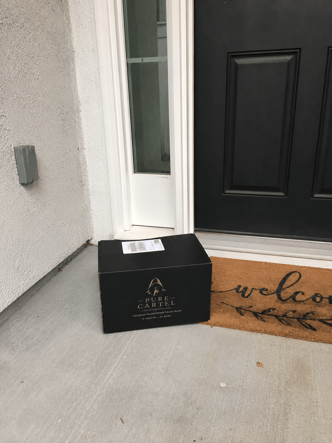Pure Cartel box delivered to the front doorstep